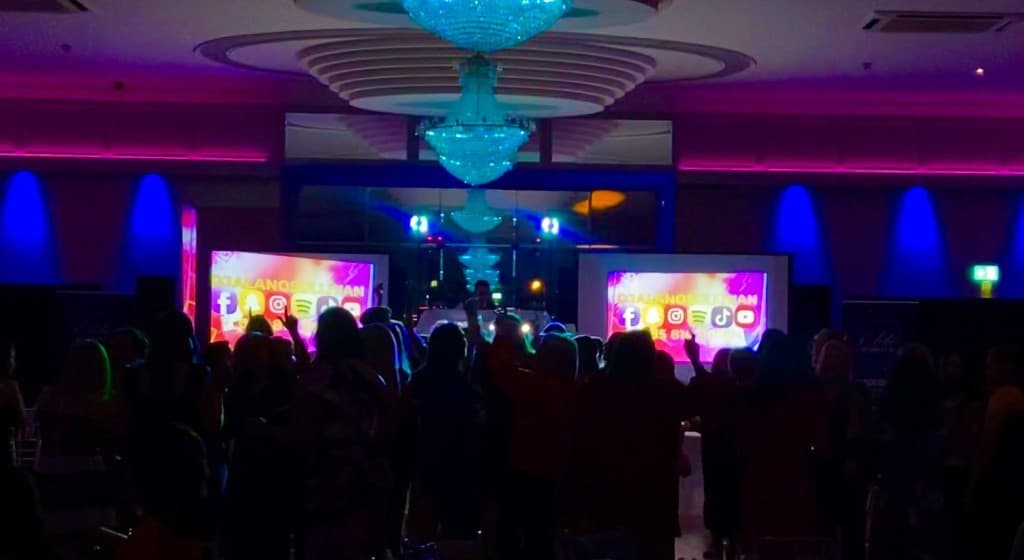 Dancefloor with AOS Entertainment DJ branding, Cork