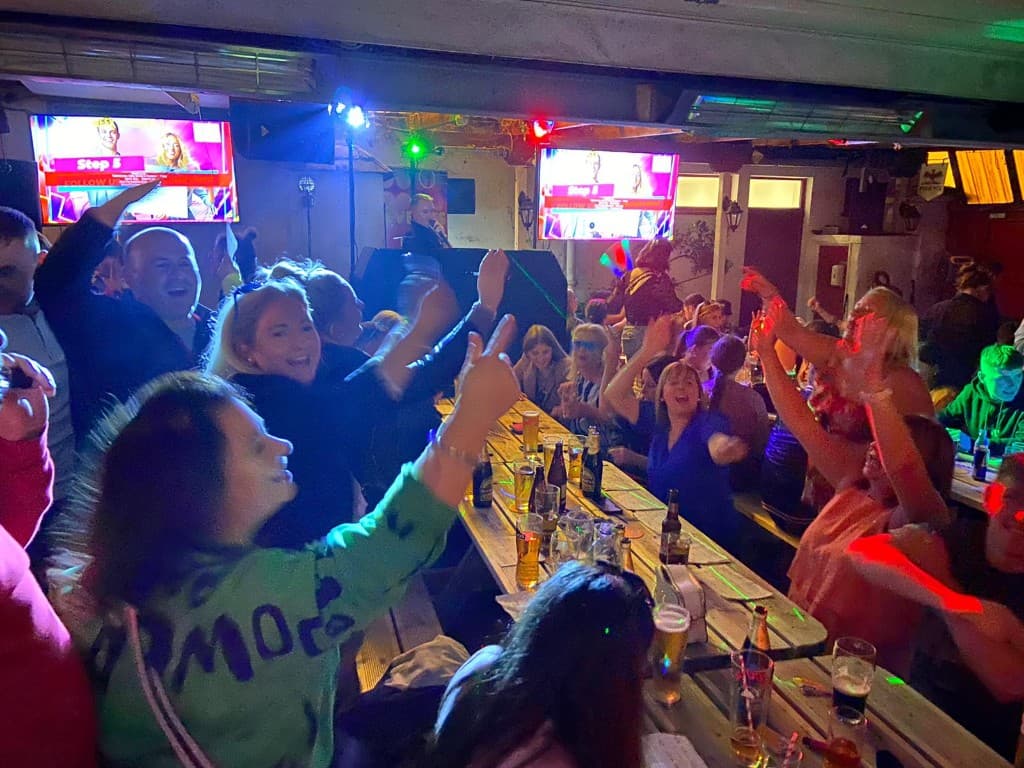 Players celebrating at a Music Bingo night