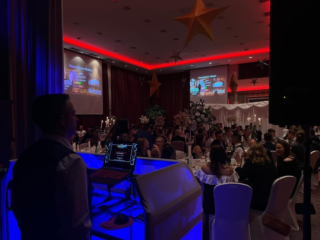 Wedding reception dancefloor at a Cork event with DJ setup and guests